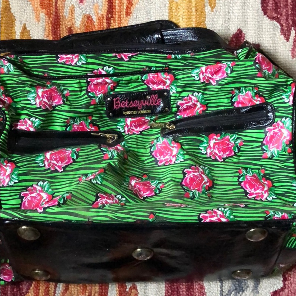 Betseyville green zebra & floral print weekend bag